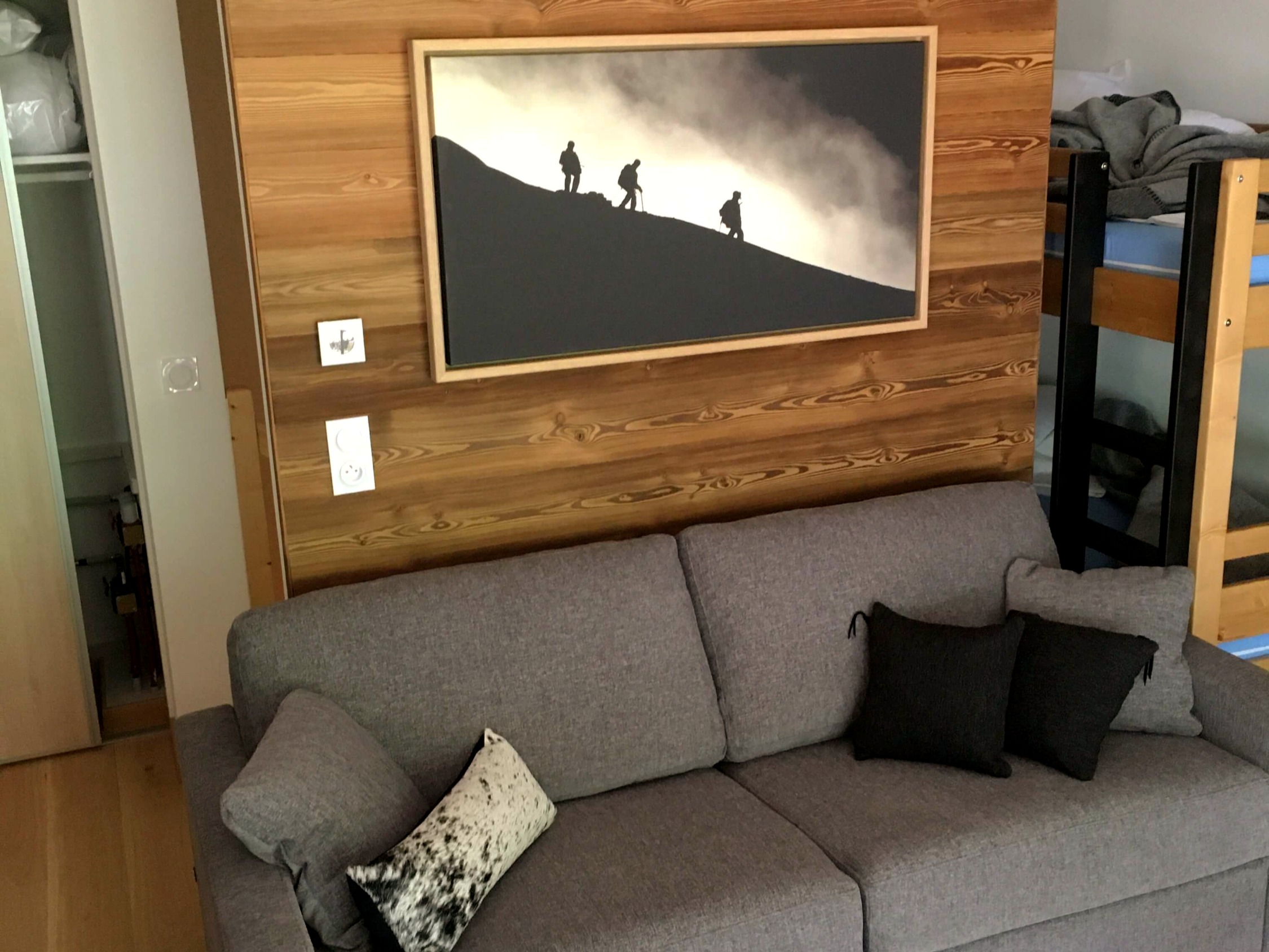 Living room with bunk bed in the nook